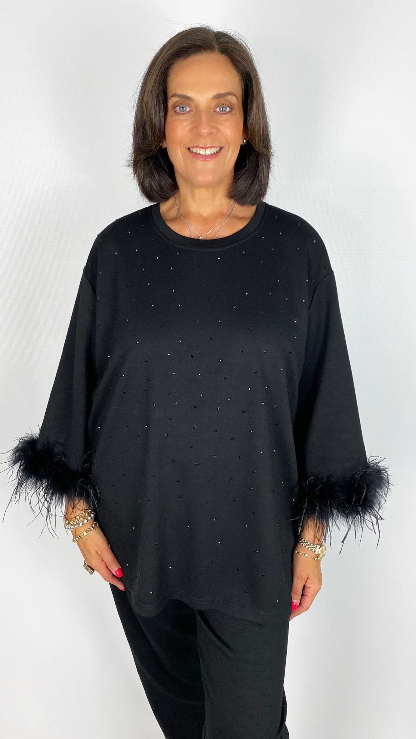 Silky soft jersey studded top w/ feather cuffs | Black | by Malissa J