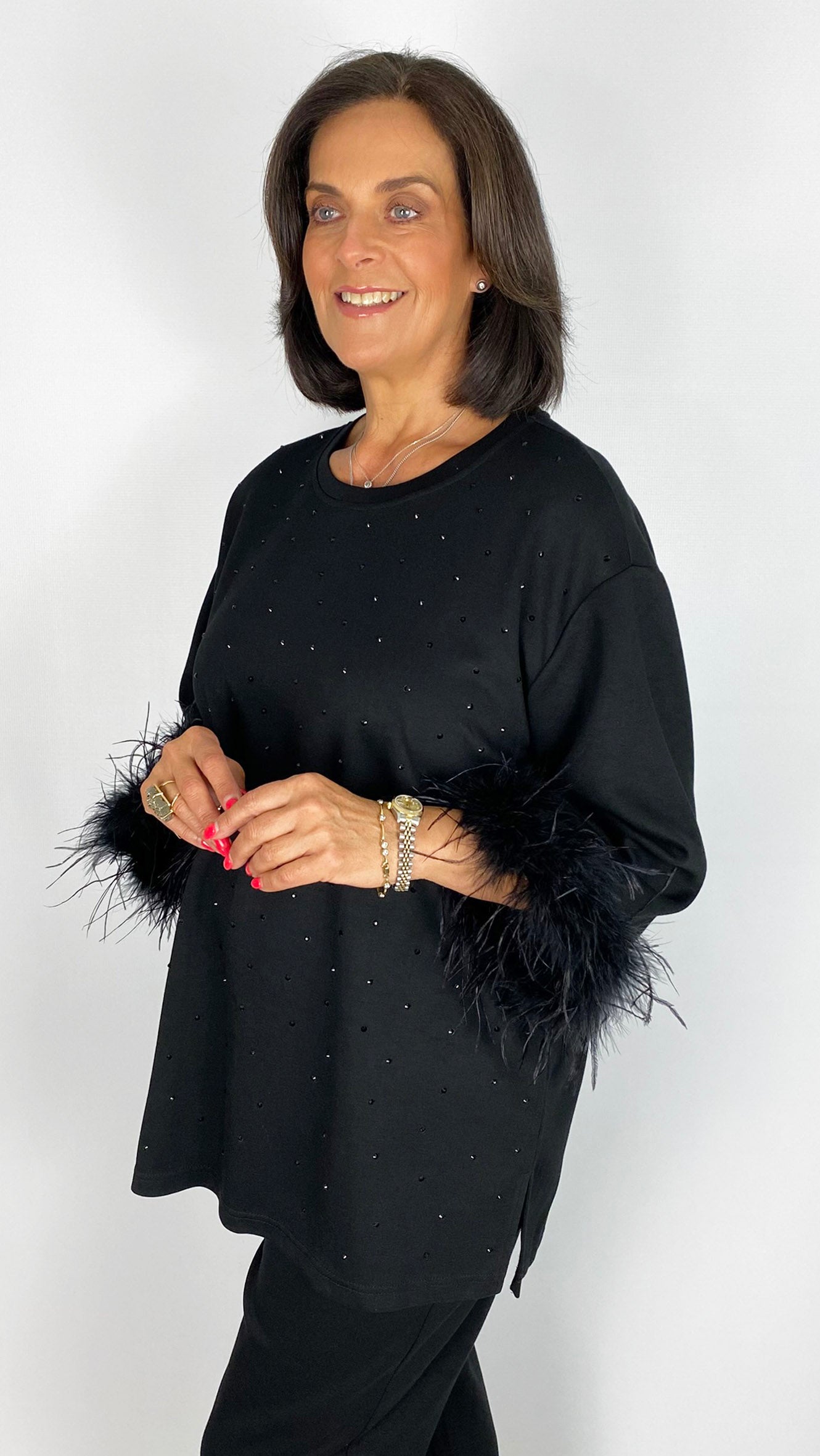 Silky soft jersey studded top w/ feather cuffs | Black | by Malissa J