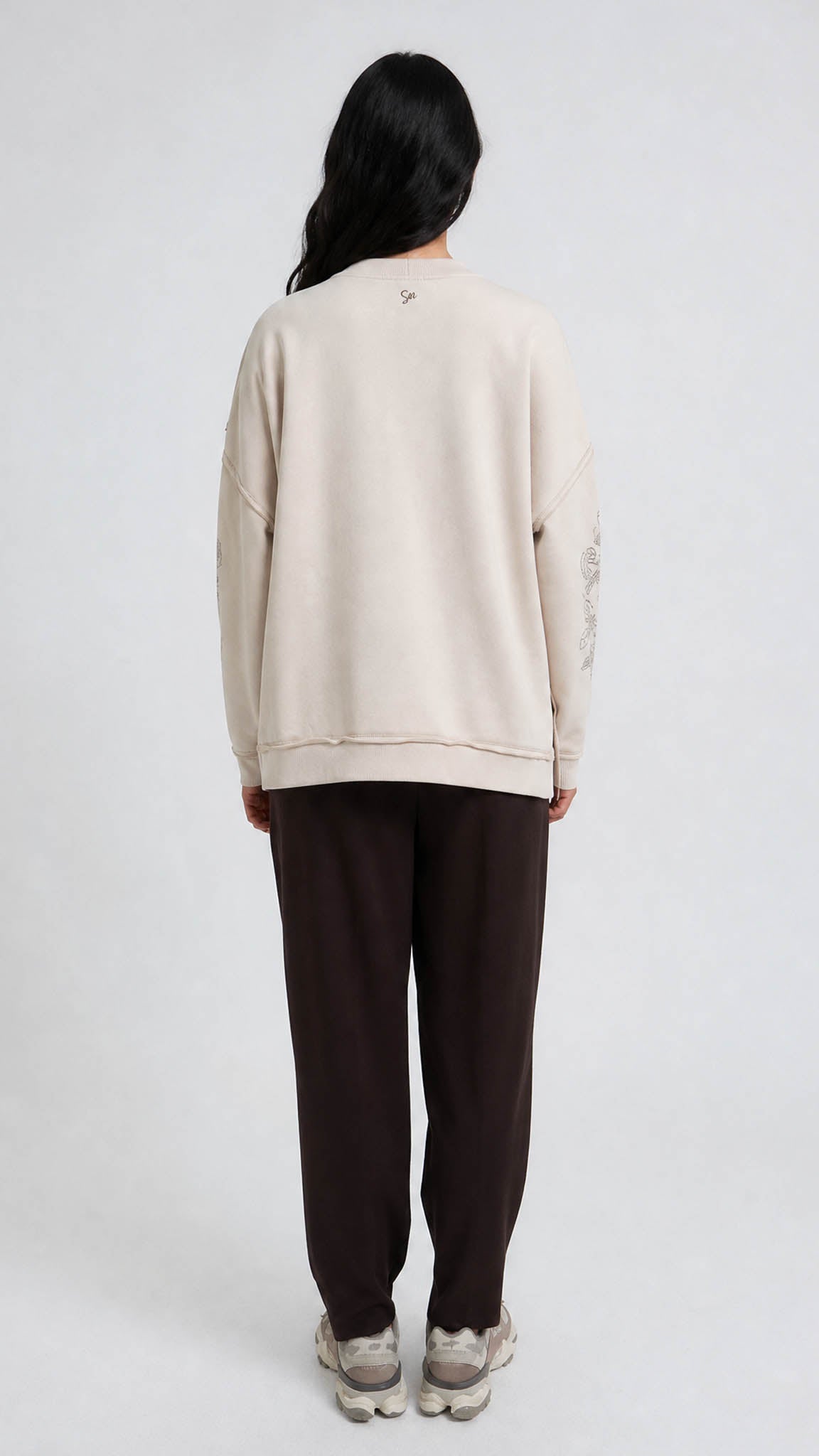 Embroidered sleeve exposed seam sweatshirt | Oat Milk | by Smith & Soul