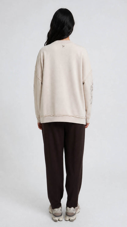 Embroidered sleeve exposed seam sweatshirt | Oat Milk | by Smith & Soul
