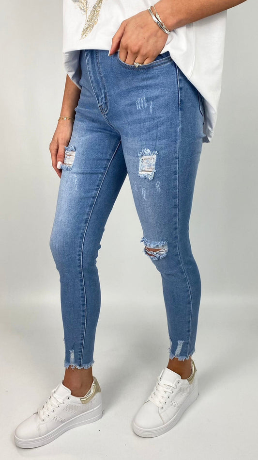 Distressed & frayed-hem stretch denim jeans