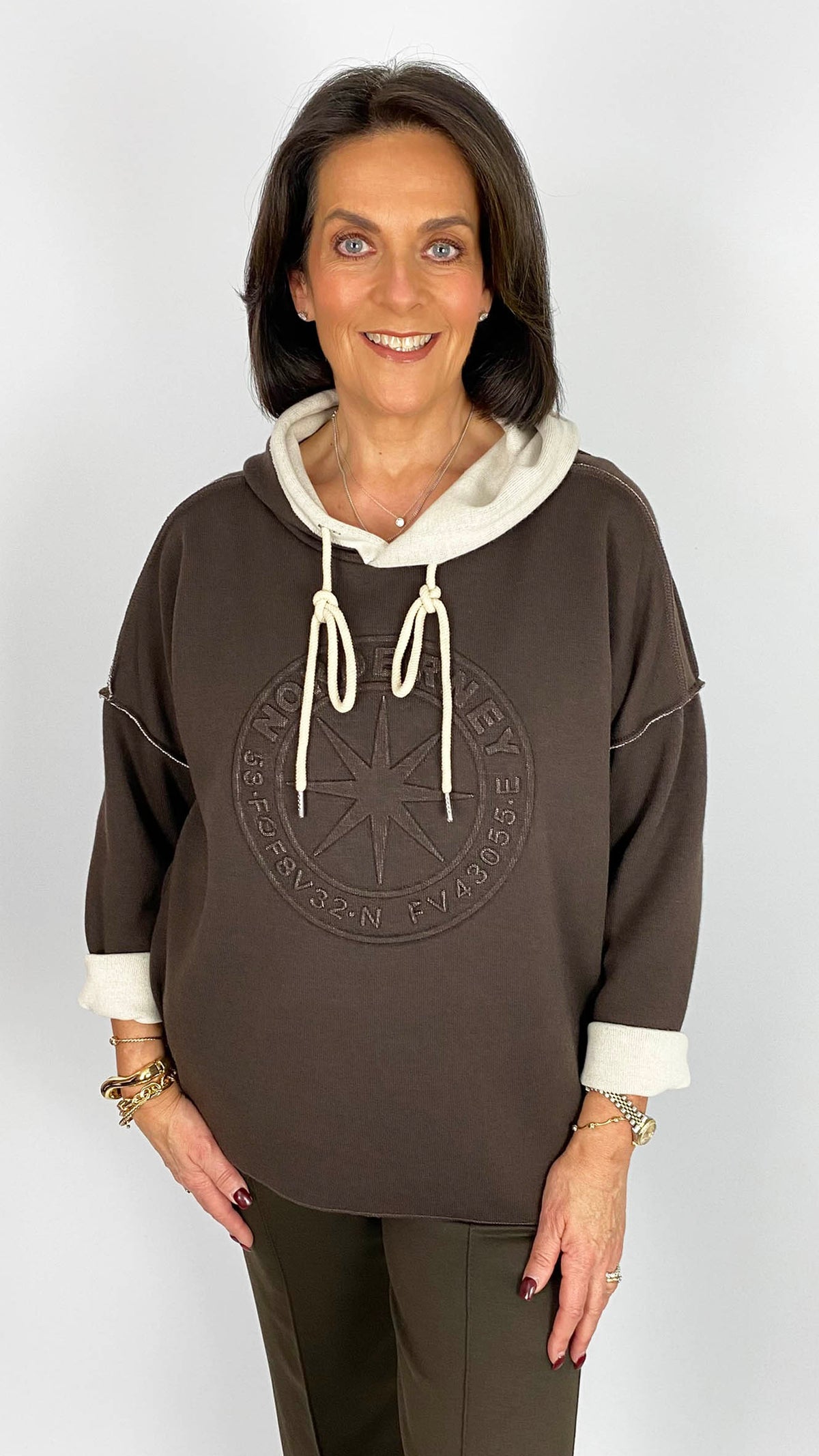 Embossed motif exposed seam hooded sweatshirt | 3 Colours