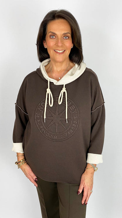Embossed motif exposed seam hooded sweatshirt | 3 Colours