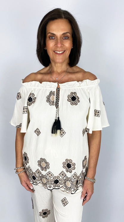 Embroidered on/off-the-shoulder top | Mono | by Malissa J