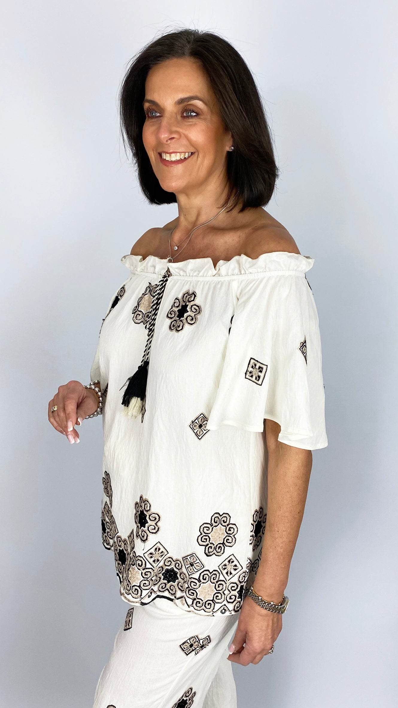 Embroidered on/off-the-shoulder top | Mono | by Malissa J