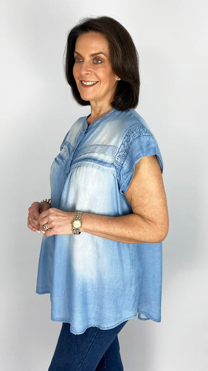 Collarless cap sleeve chambray shirt
