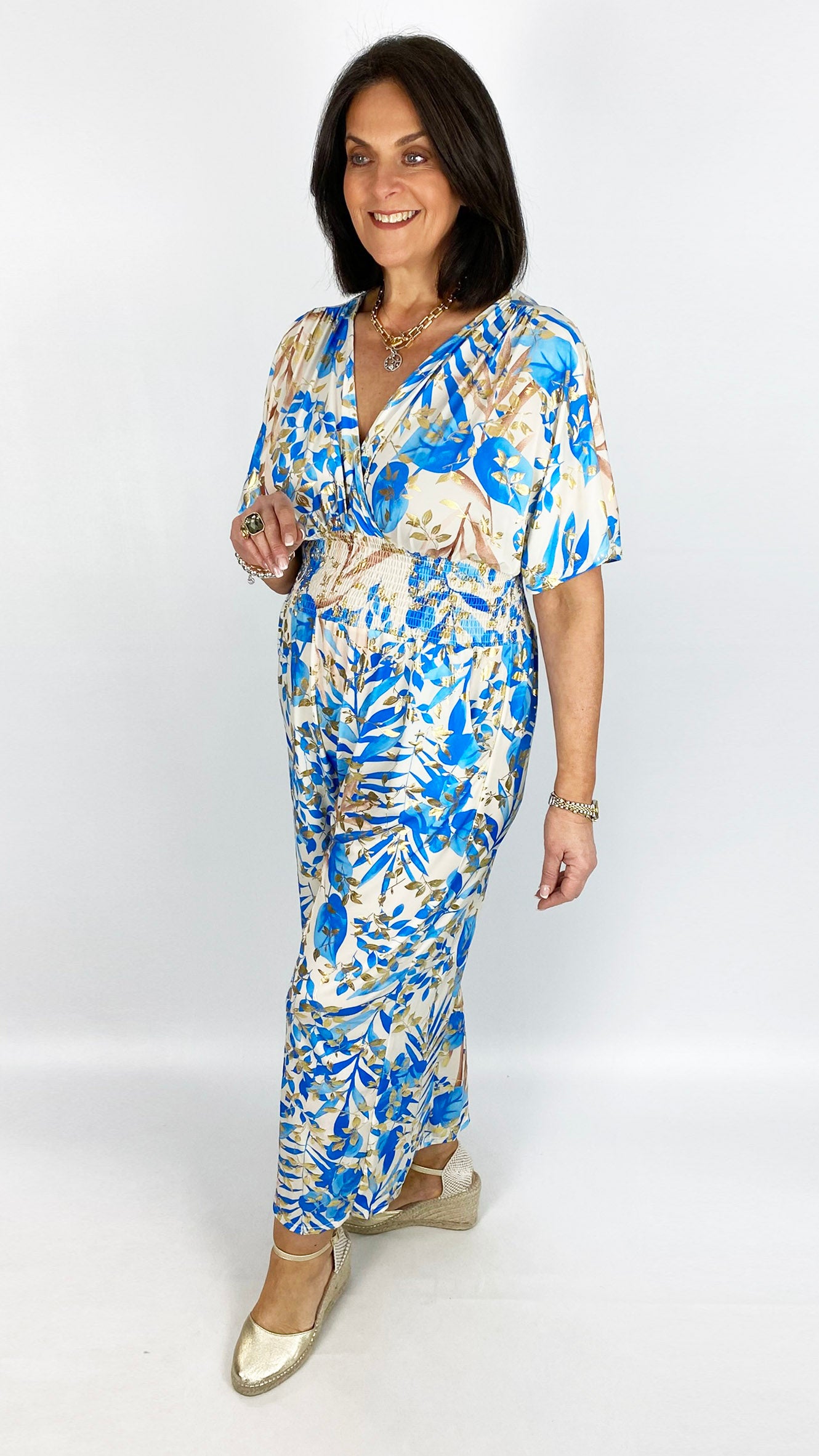 Crease-free crossover jumpsuit | 4 Gold-enhanced prints